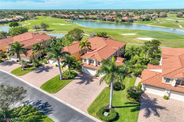 bird's eye view with a water view