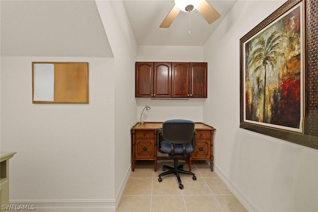 tiled office featuring ceiling fan