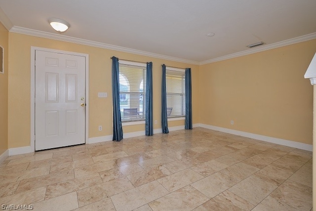 spare room featuring ornamental molding