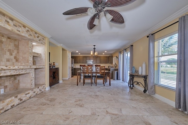 unfurnished dining area with ornamental molding and ceiling fan with notable chandelier