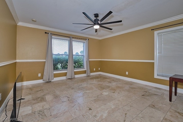 empty room with crown molding and ceiling fan