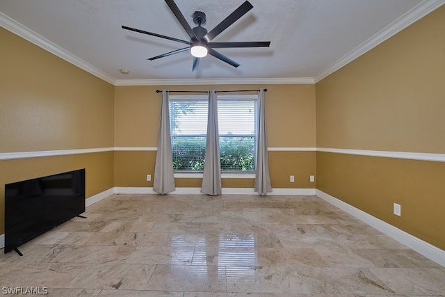 spare room with ceiling fan and ornamental molding