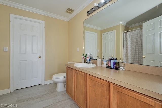 bathroom with crown molding, vanity, wood-type flooring, a shower with curtain, and toilet