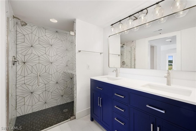 bathroom featuring vanity and a tile shower