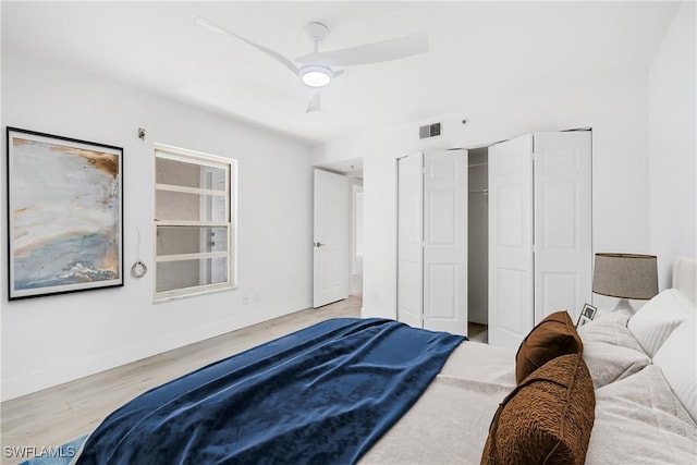 bedroom featuring ceiling fan and light hardwood / wood-style flooring