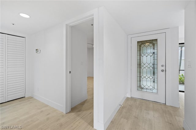 entryway with light hardwood / wood-style floors