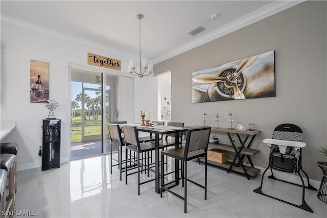 dining space featuring an inviting chandelier and crown molding