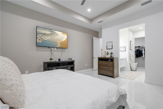 bedroom featuring ensuite bathroom and ceiling fan