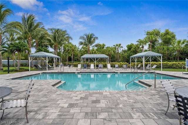 view of pool featuring a gazebo and a patio