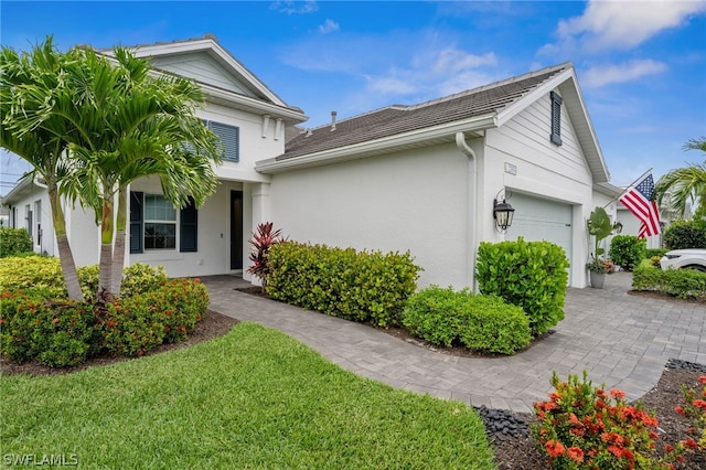 view of front of property with a garage