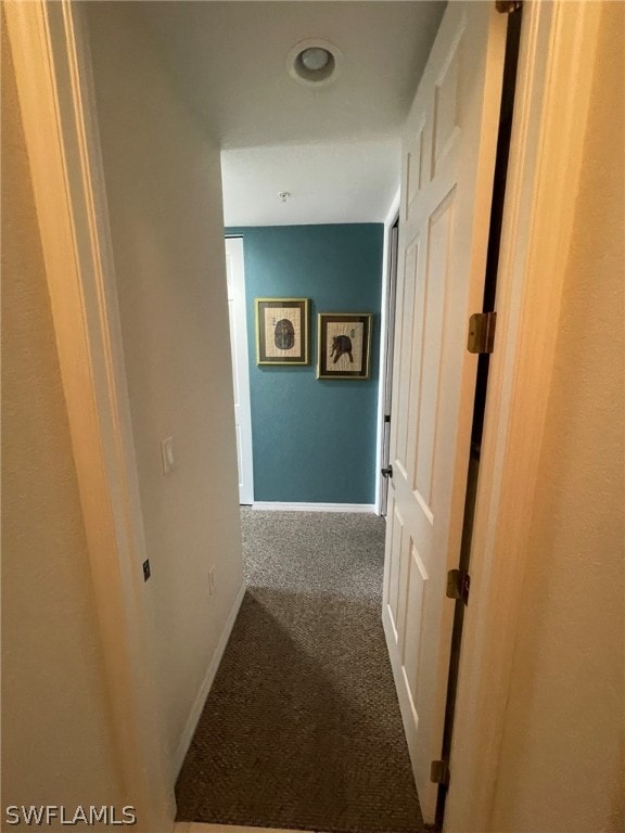 hall featuring carpet floors