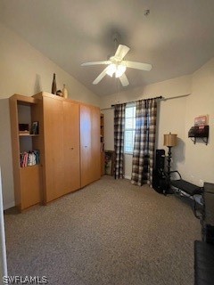 workout room with carpet flooring and ceiling fan