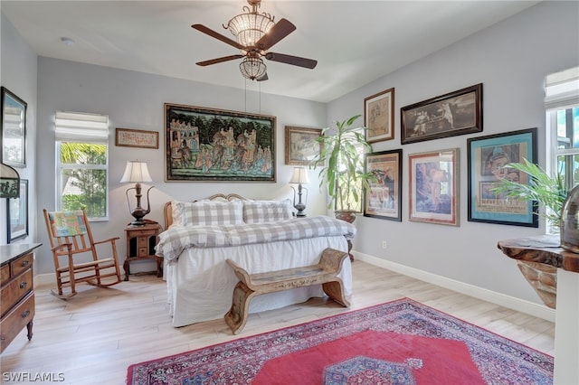 bedroom featuring ceiling fan and light hardwood / wood-style flooring