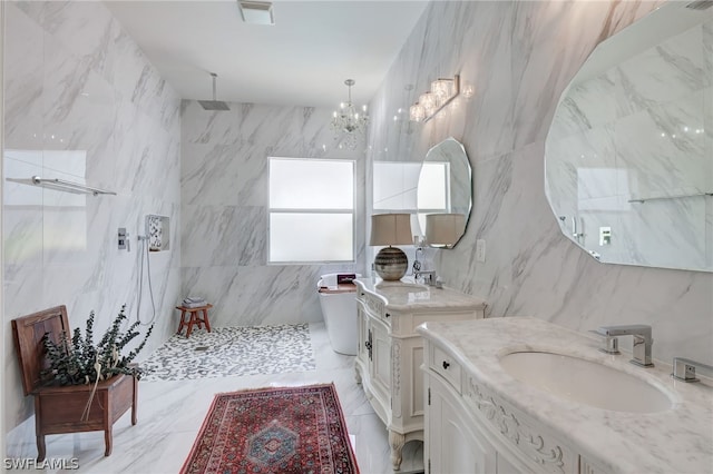 bathroom featuring vanity, tile walls, and walk in shower