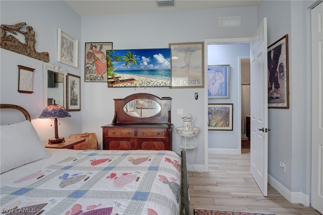 bedroom featuring light hardwood / wood-style flooring