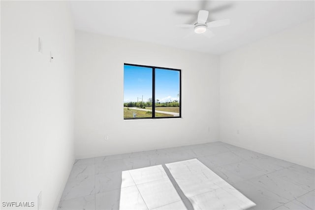 unfurnished room featuring ceiling fan