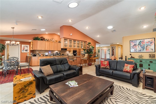 living room featuring vaulted ceiling, an inviting chandelier, and light tile floors