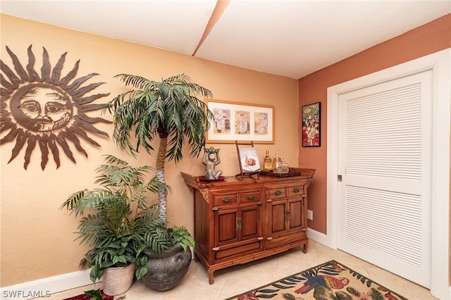 interior space featuring light tile floors