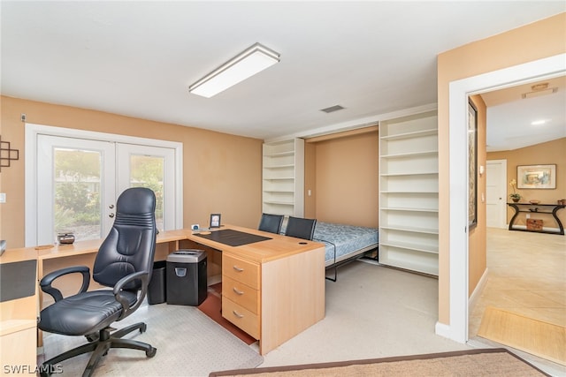 office space with light carpet and french doors