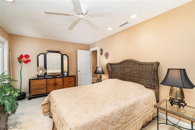 carpeted bedroom featuring ceiling fan