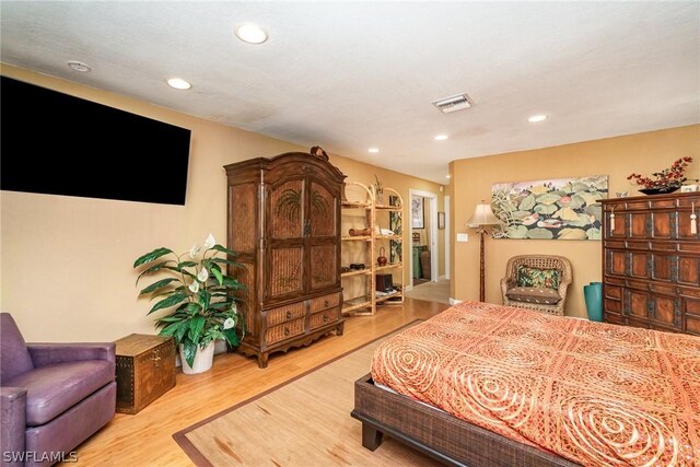 bedroom with light wood-type flooring