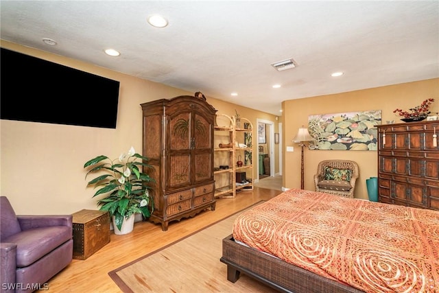 bedroom featuring hardwood / wood-style floors