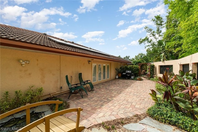 view of patio featuring french doors