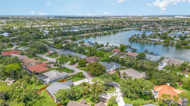 bird's eye view with a water view