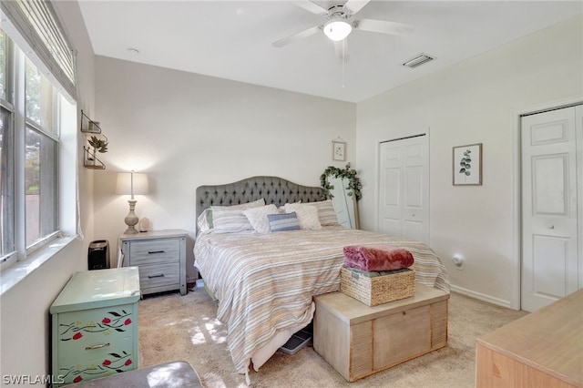 carpeted bedroom featuring ceiling fan