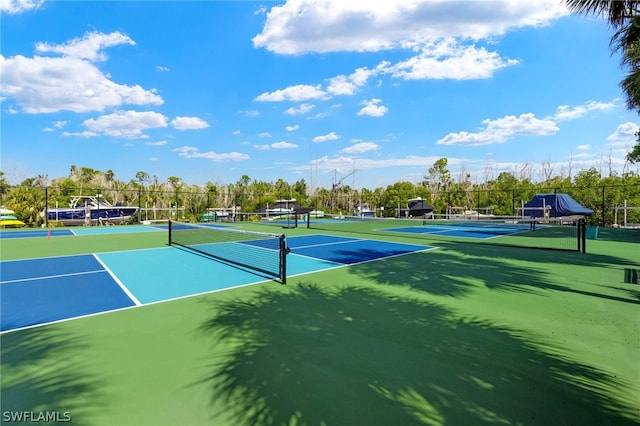 view of tennis court with basketball court