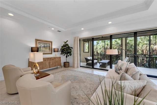 4751 Via Del Corso Ln Unit 101, Bonita Springs, FL 34134 - tiled living area featuring a tray ceiling, crown molding, plenty of natural light, and recessed lighting