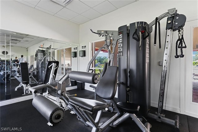 gym with a drop ceiling