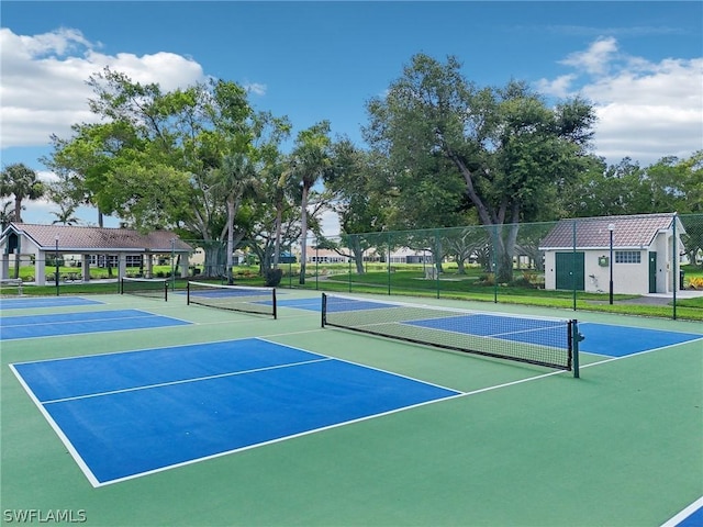 view of tennis court with basketball court