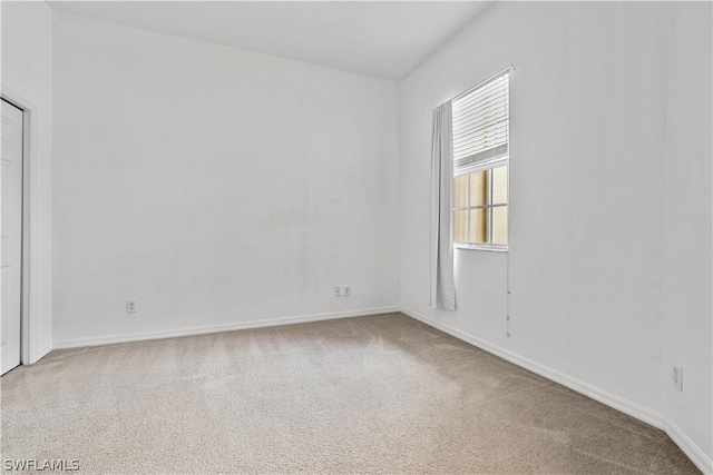 empty room featuring carpet floors