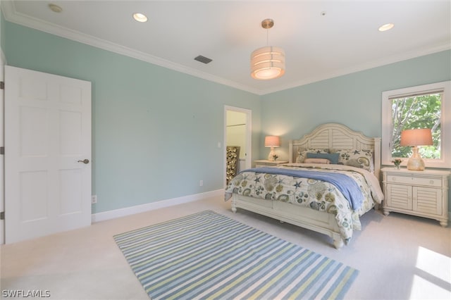 carpeted bedroom featuring ornamental molding