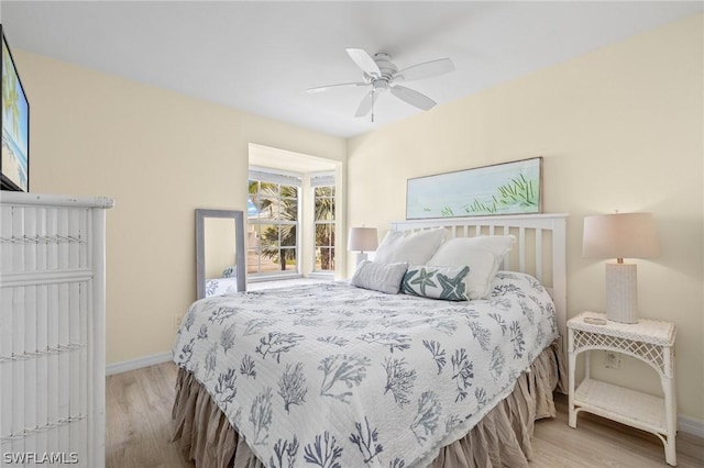 bedroom featuring light hardwood / wood-style flooring and ceiling fan