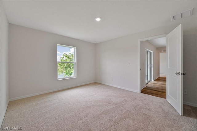 view of carpeted spare room