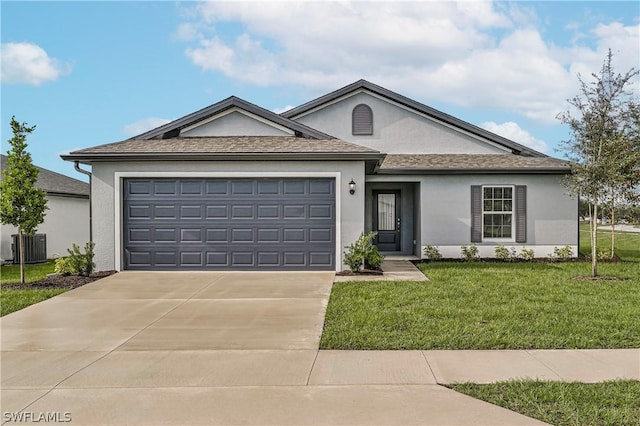 ranch-style home featuring central AC unit, a front yard, and a garage