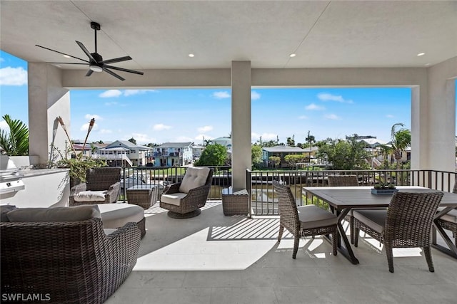 view of patio featuring ceiling fan and an outdoor hangout area