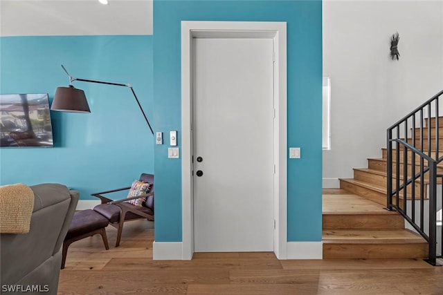 foyer with hardwood / wood-style floors
