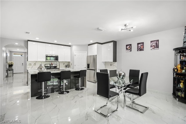 view of tiled dining room