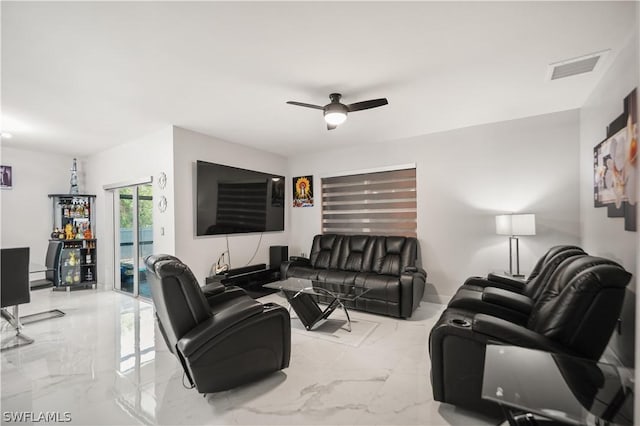 living room featuring ceiling fan