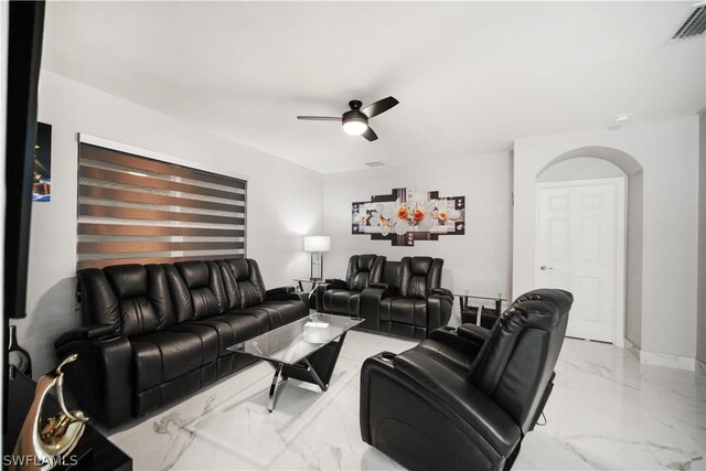 living room featuring ceiling fan