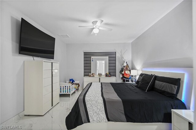 bedroom featuring ceiling fan