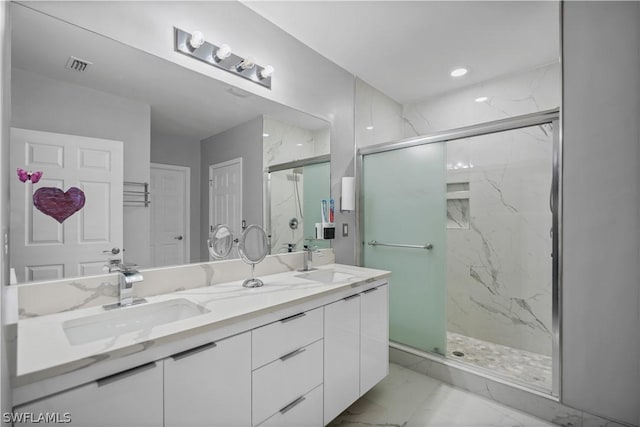 bathroom with vanity and walk in shower