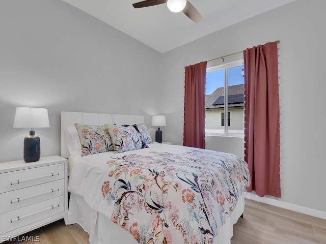 bedroom featuring ceiling fan and light hardwood / wood-style flooring