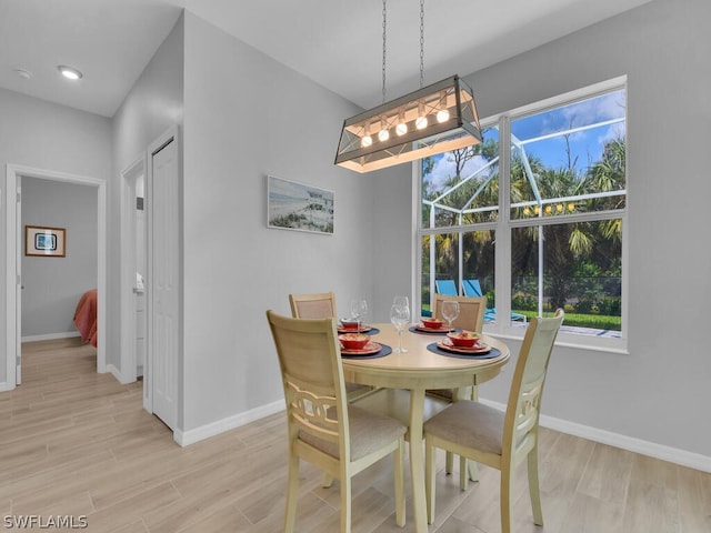 dining room with light wood-type flooring