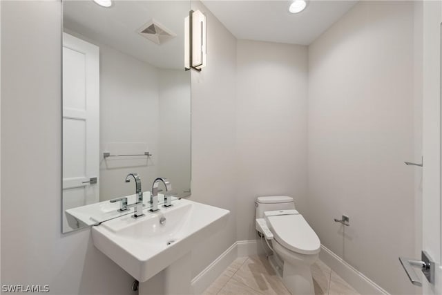 bathroom featuring toilet