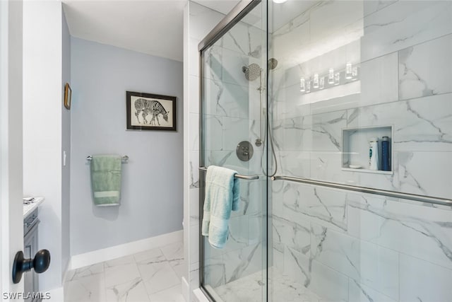 bathroom with vanity and an enclosed shower