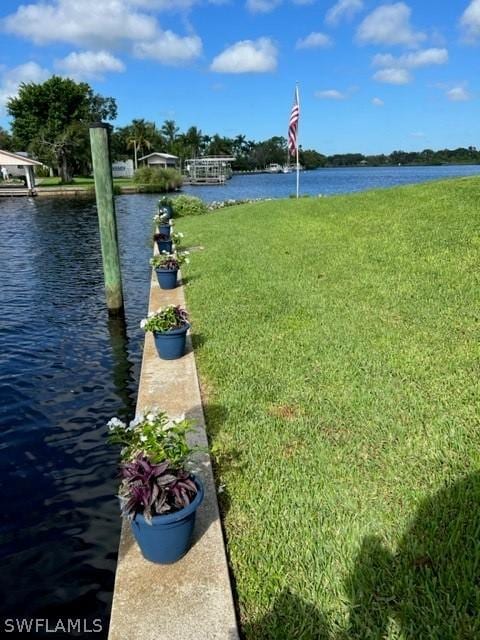 view of yard with a water view